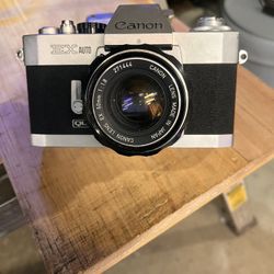 Two Cameras , A Canon Ex Auto & A Olympus 35 R C