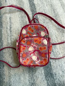 Dumbgood x Sanrio Pochacco mini red backpack