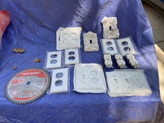 Electric Plugs And Wall Covers And Saw Blade