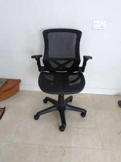 Home Office Desk Chair purchased from Costco.  Pre-owned. Black. Adjustable.