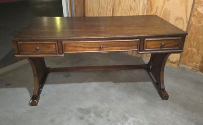 traditional-style dark wood writing desk