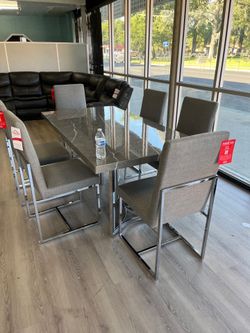 New seven piece dining set with table and six chairs