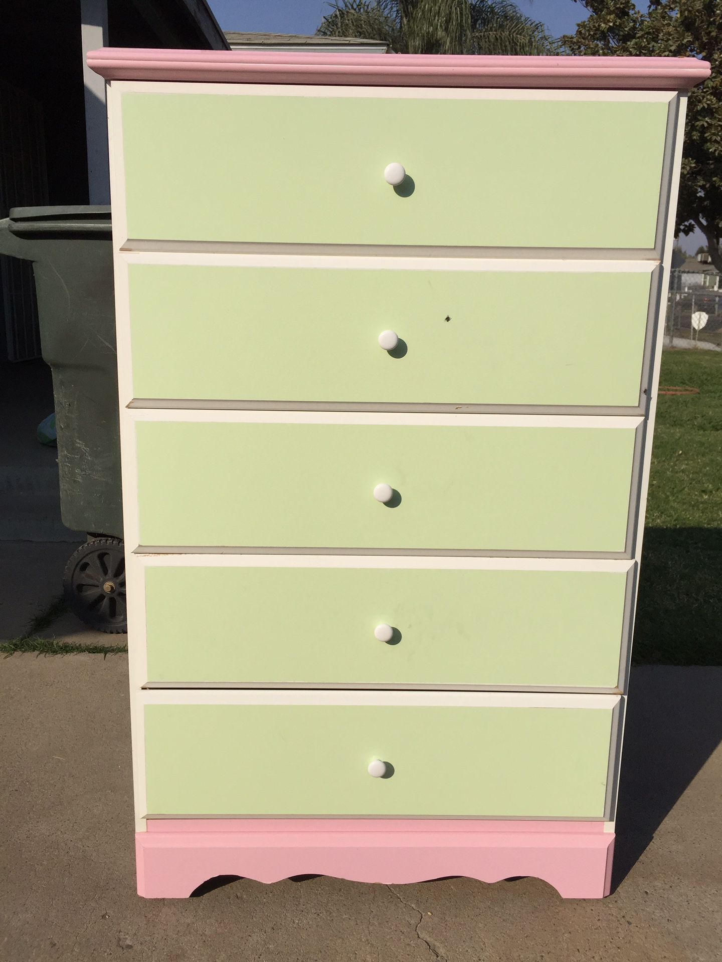 Tall dresser with five drawers all drawers open fine.