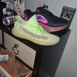 One pair of Air max in one pair of Kanye Shoes.  Eleven and a half And a10 half