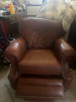 Leather sofa recliner