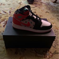 Air Jordan 1 Ugly Sweater Mid