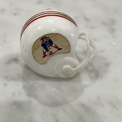vintage 1970's gumball mini football helmet with the New England Patriots logo