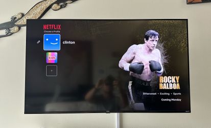 TCL Roku TV with Full Motion Wall Mount