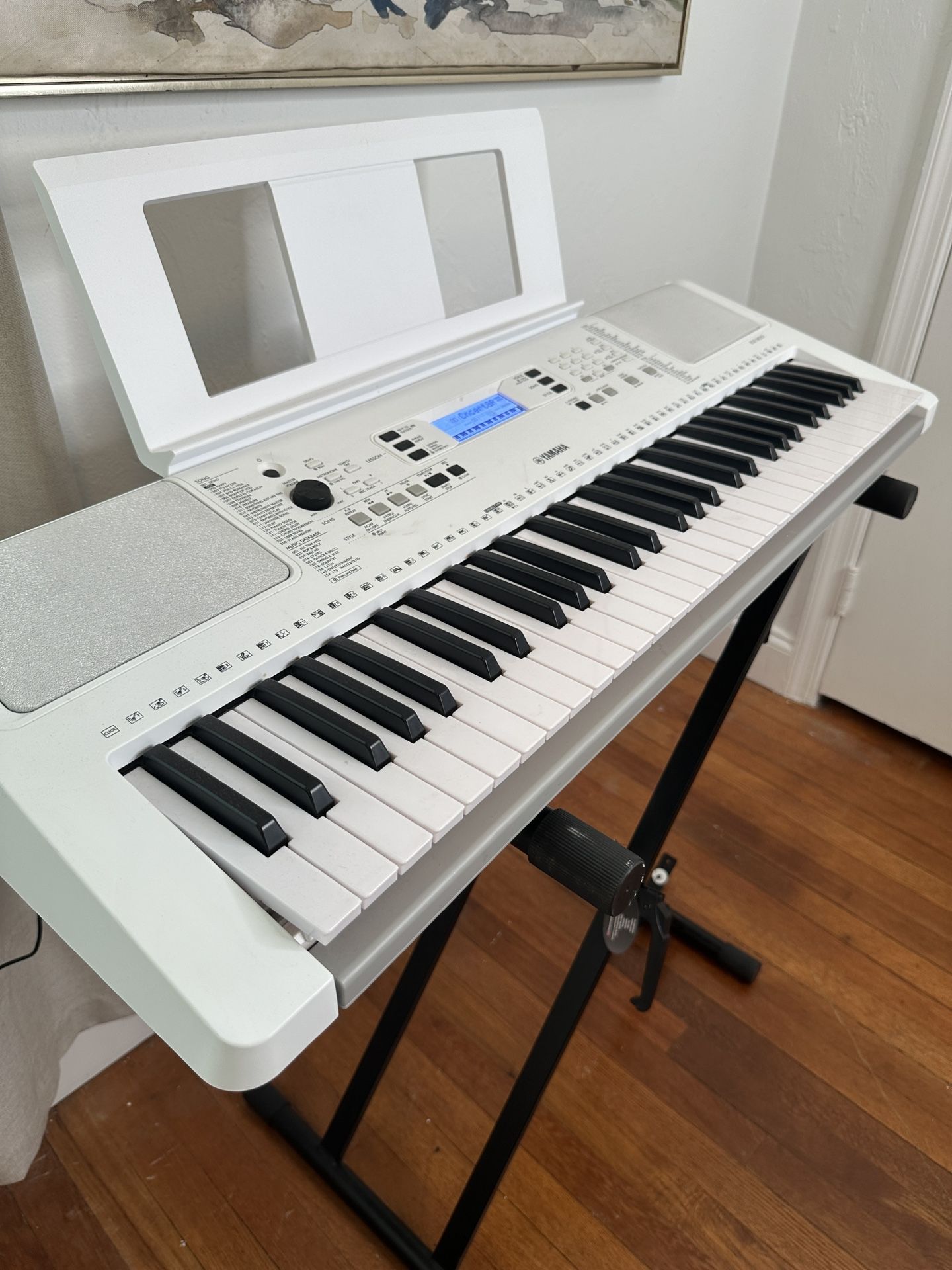 Yamaha EZ300 61-Key Keyboard with Lighted Keys Including Power Cord & stand