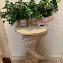 Artificial plants in ceramic pots