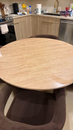 Anthropology Round Travertine Dining Table