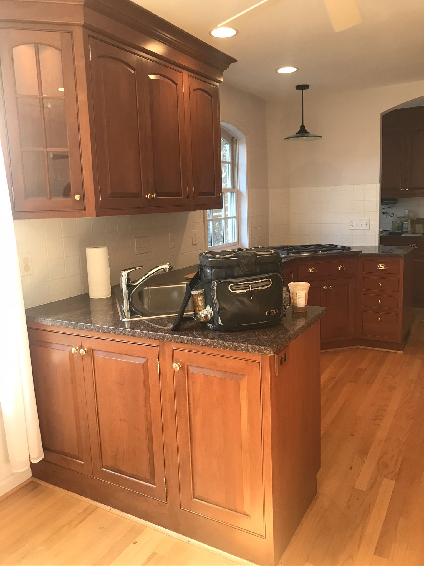 Inset wood cabinets with brass hardware- cute kitchen for sale, good quality