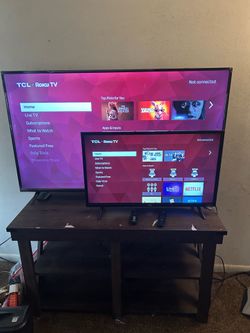 2 flat screens w/ stand