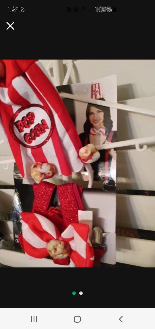 Pop Corn Vendor And Bag Of Popcorm