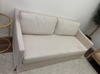 BEIGE COMFY MEDIUM SIZED COUCH