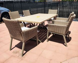 New.  Hampton Bay Holly Cove 7-Piece Wicker Outdoor Dining Set with Almond Cushions.