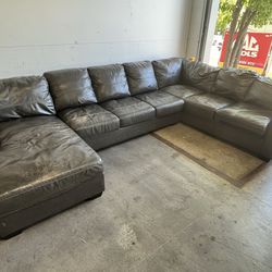 Grey Ashley Furniture Leather Sectional Sofa Couch - Chaise - Fair Condition - Delivery Available 