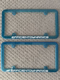 License frames “Efficient dynamics” 2 pieces in transparent blue color.