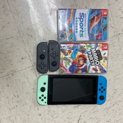 Nintendo Switch With 3 Games And Another Pair Of Controllers