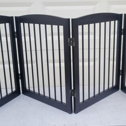 New in box 4 panel pet gate barrier measures 24" high and 80" wide. Dark Brown