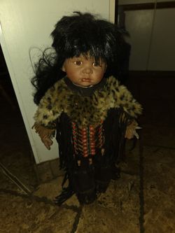 Poor slain indian doll