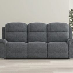 BROOKS reclining grey couch from JEROMES - only a year old!
