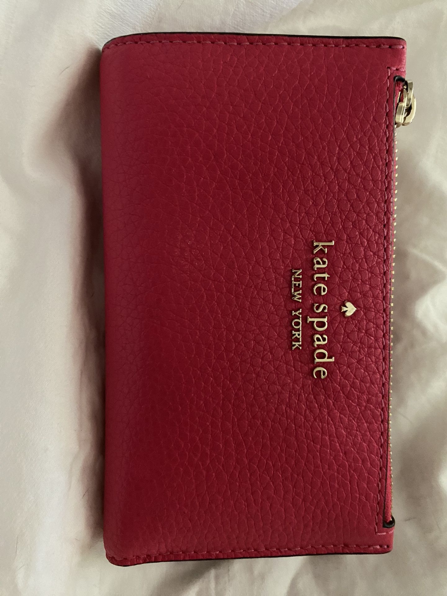 Authentic Kate Spade bi-fold small wallet