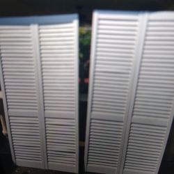 Two Plastic Fold Up Doors