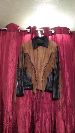 Vintage leather coat with fringe