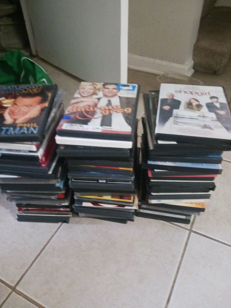 65  DVDs (Some Are Still In Plastic Never Opened)