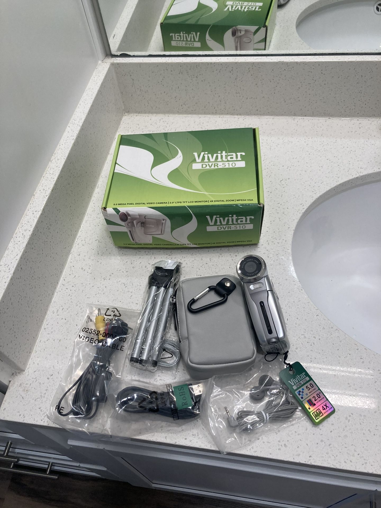 Vivitar Dvr-510 5MP MPEG4 Camcorder with stand and earbuds