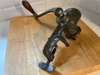 Vintage Universal No. 2 hand-crank meat grinder made by Landers, Frary & Clark of New Britain, Connecticut.
