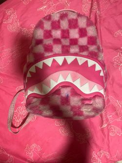 Pink checkered spray ground