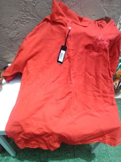 Camisa de polo talla #2X $20
