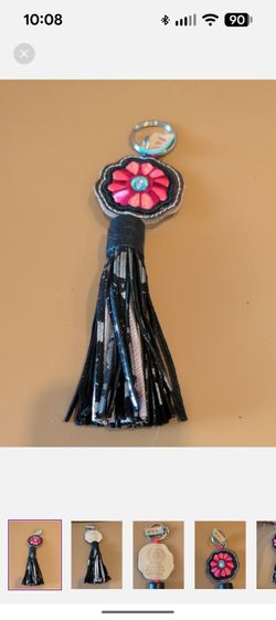 Consuela leather embroidered tassel charm