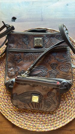 Disney Dooney and Bourke Walt Disney World  purse and pouch
