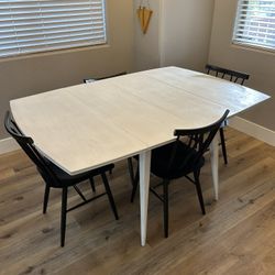 Mid Century Modern White Table With Black Dining Chairs
