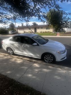 2014 VW Jetta, 140k miles clean title + 2 new tires