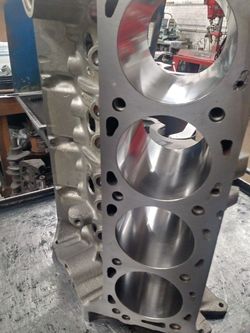Kelley's machine shop on 40 year old business family-owned throwing down a sick 460 boat motor
