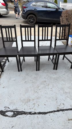 Very good condition four hardwood chairs
