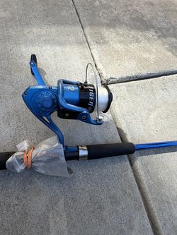 Caña de pescar y caja de pesca la báscula es para un aproximado de 50 libras