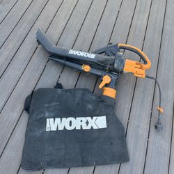 WORX electric leaf blower, vacuum, and mulcher combo.