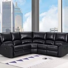 New Power Reclining Sectional .  Black Leather Air.  80”x80”x39”H.  Free Delivery !