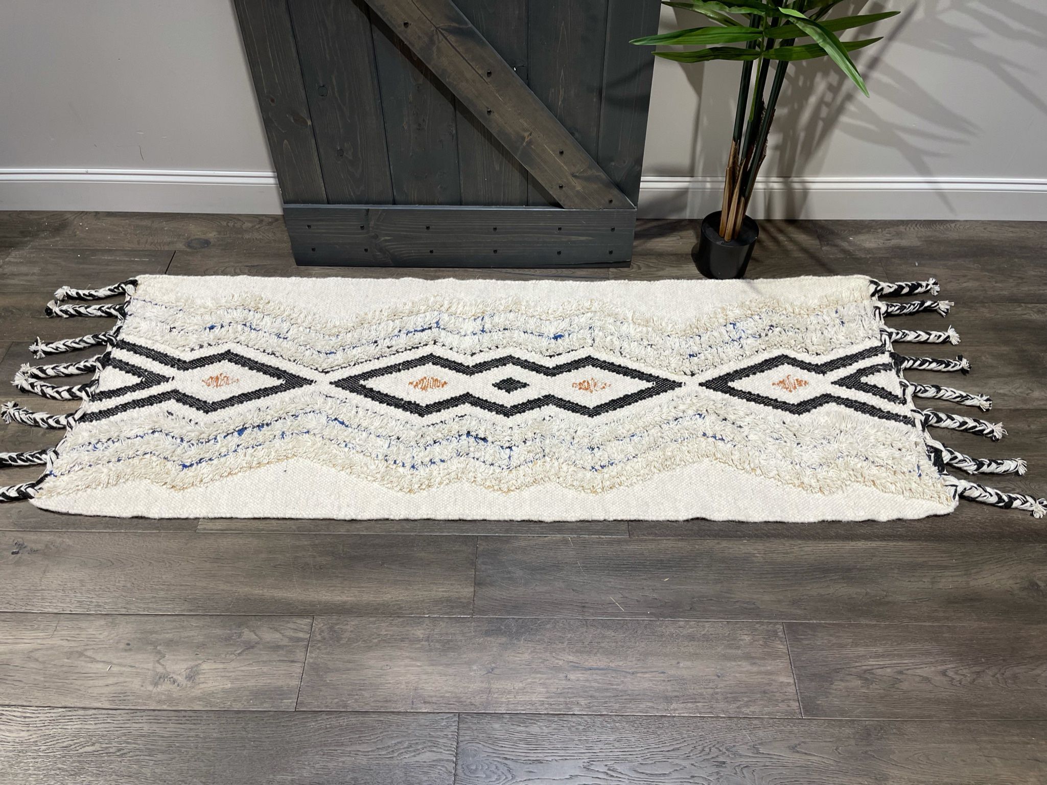 {ONE} Lizette southwestern hand-knotted ivory/black/blue area rug - 2’3” x 6’ rectangle. Material: Cotton; wool. Indoor use only. MSRP: $578. Our pric