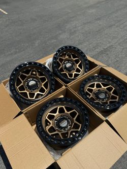 KMC Torx Bronze Black Lip 17” Wheels Off-Road Chevy GMC 6x5.5 Available Brand New Rims