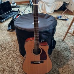Fender CD280SCE NAT acoustic electric guitar.