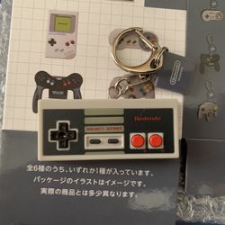 Brand new Nintendo Museum Mystery Box Nintendo Entertainment System NES Controller Keychain
