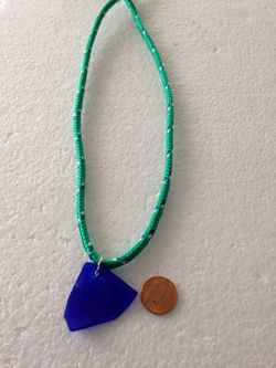 Cobalt blue glass pendant necklace on 30" diamond braided cord