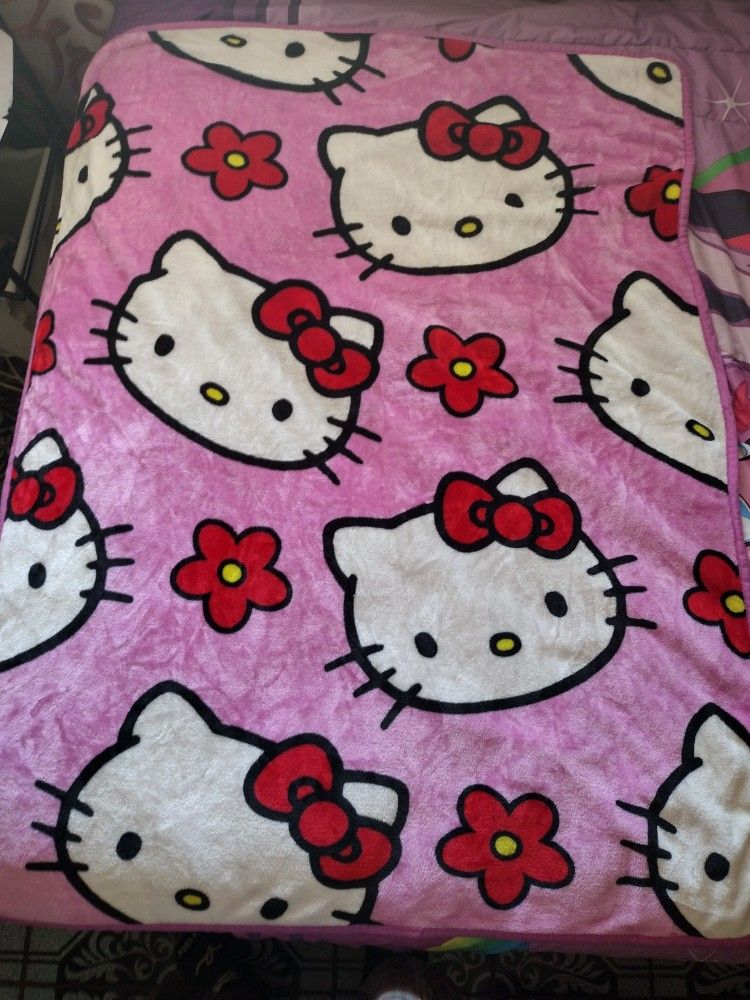 Small Kid Sized Hello Kitty Blanket.