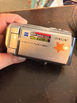Sony Handycam DCR-SX60- Works but needs charger for battery, maybe a new battery too